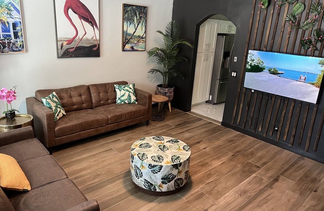 Modern Vacation Home with pool- Conveniently located to Restaurants & Beach