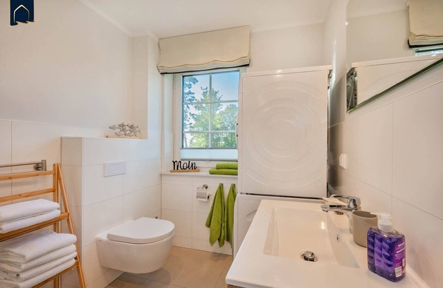 Modern vacation home in fishing village with sauna & garden in quiet village location