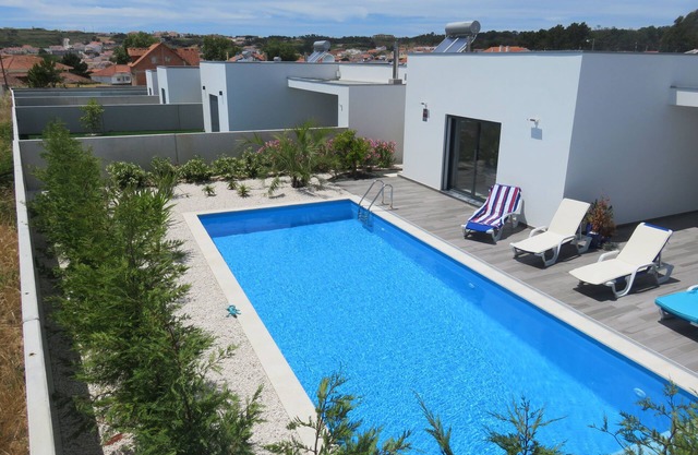 Modern villa with terrace and heated pool close to the lagoon and ocean