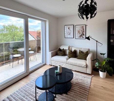 Moderne Ruheoase mit Balkon