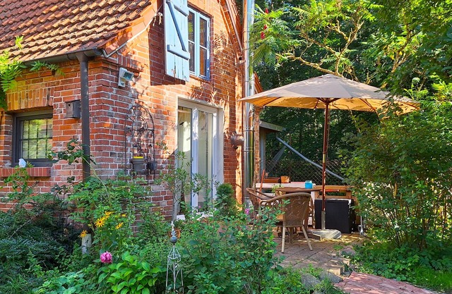 Modernized stable with comfort and flair between forest and lake