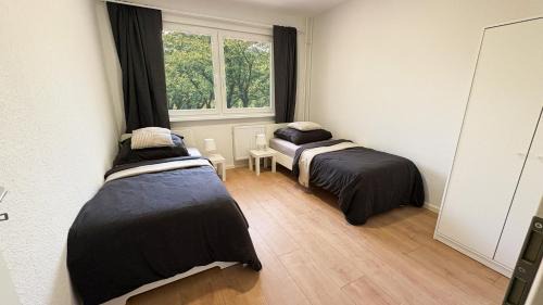 Monteurwohnungen mit TV, Internet, Parkplatz, Waschmaschine, Küche, Balkon, Restaurants und Supermarkt