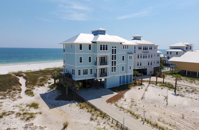 Morning Breeze by GSVR | Fabulous Beachfront Home w/Pool & Elevator + FREE Activities/Golf