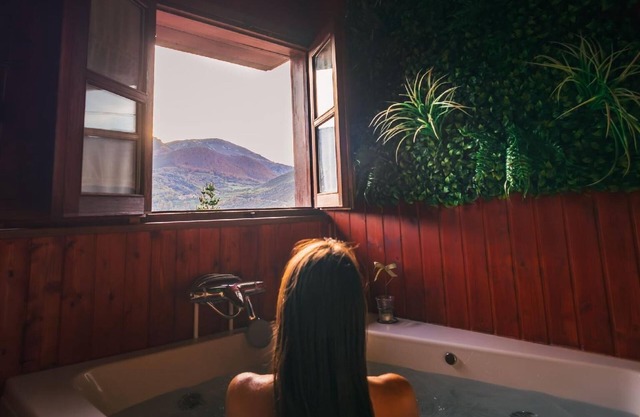 Mountain hut with terrace, fireplace and jacuzzi