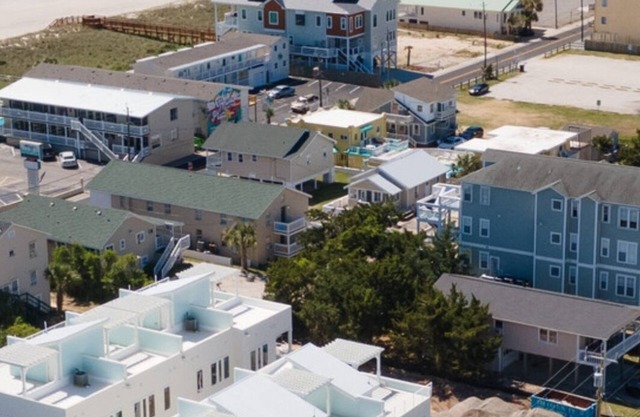 Nalu Townhomes vacation steps from the beach with rooftop patio!
