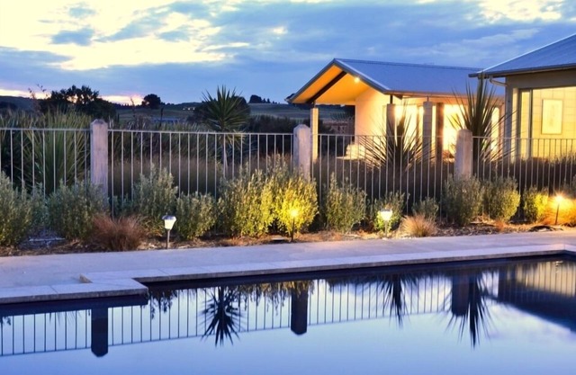 Nestled in vineyard with views to Cape Kidnappers