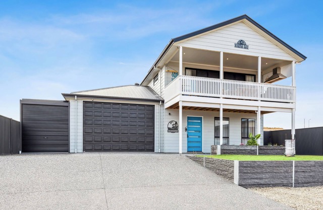 NEWLY BUILT END OF 2024, THIS SPACIOUS RIVER HOME ACCOMMODATES UP TO 13