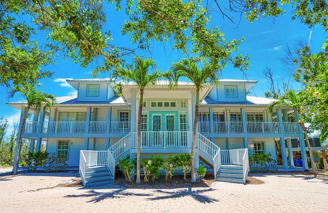 Newly Refurbished, 6 Bedroom Estate Located Bay Front and Across from the Beach