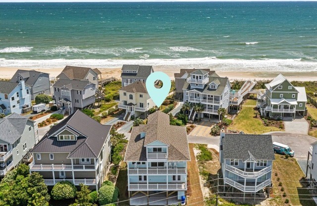"Ocean Sounds" - 2nd Row 7 Bedroom Home - Elevator, Community Pool
