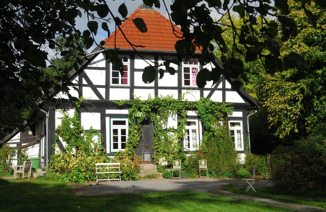 Old forester's house at Ippenburg Castle, surrounded by a large garden