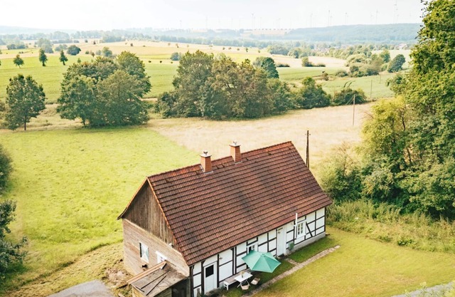 Old forester's lodge on the edge of the forest
