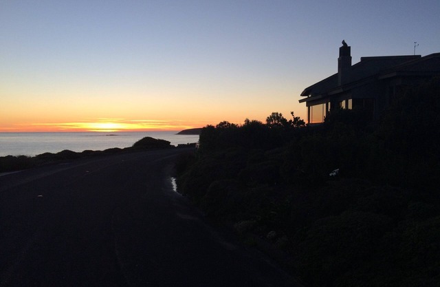 ON A BLUFF WITH 180 DEGREE CLOSE WATER VIEWS SHORT WALK TO THE BEACH