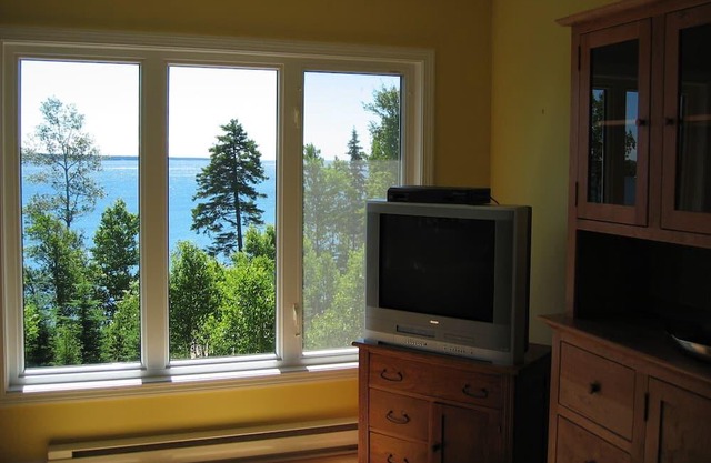 Open Concept Waterfront Home On Private Sandy Beach