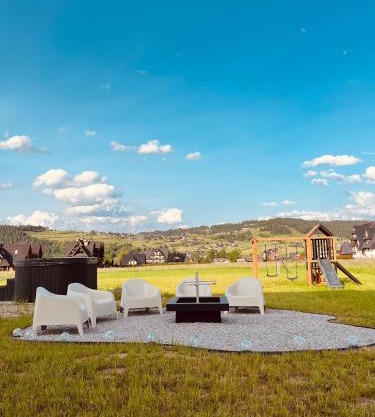 Osada Kaniówka - domki pod stokiem z sauna