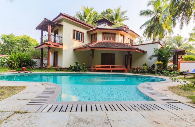 Outdoor Pool with Classic Bedroom in Goa