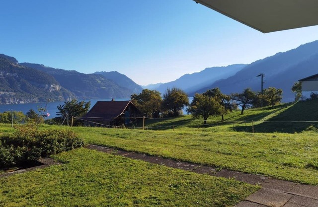 Panoramic room overlooking Lake Thun