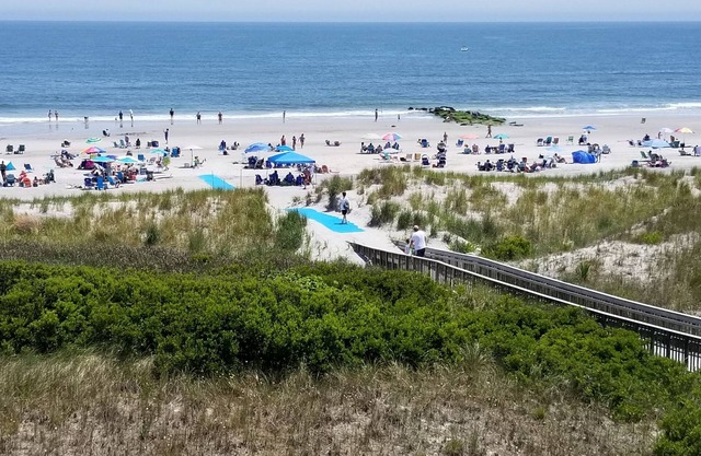 PANORAMIC VIEWS OF THE DUNES AND OCEAN FROM THREE DECKS