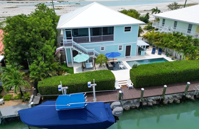 Paradise Found ~ Waterfront Pool Home, 50' Dock, Kayaks & Bikes