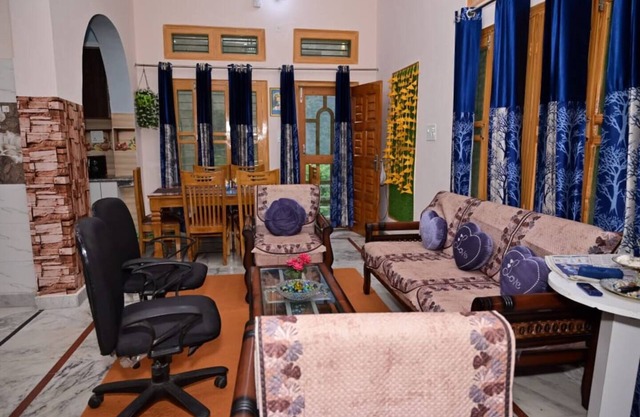 Peaceful stay : 2-bedroom, bright living area, kitchen, terrace, and garden