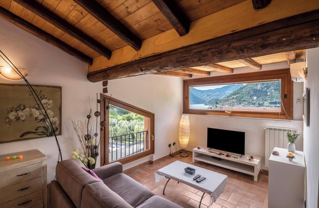 Pet-Friendly Apartment "Mansarda con vista lago" with Lake View, Pool, Wi-Fi & Terrace