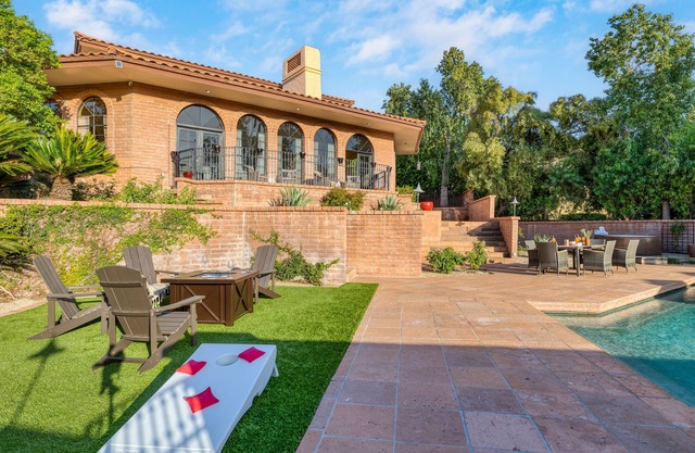 Pool, Firepit Lounge, Cornhole, and Outdoor Kitchen + Dining Area | Diamondback