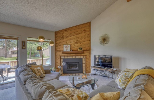 Pristine Pines: Bright Uptown Condo w/ Cozy Fireplace, Large Deck, Mountain Views, Walk to Amenities