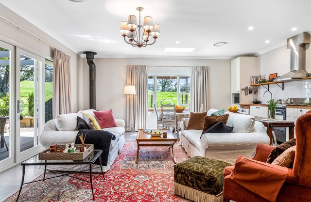 Private, stylish two bedroom cottage nestled in a spacious park like setting.