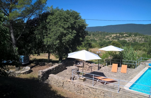 Provencal farmhouse with swimming pool in a domain of 4 ha in the middle of the village