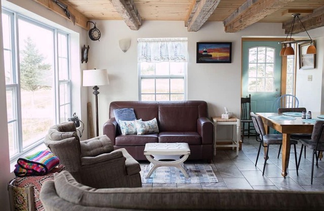Quaint house with large deck close to lighthouse on the Bay of Fundy.