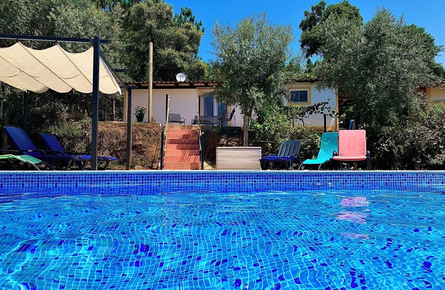 Relax, swim and unwind at this Portuguese house 5 minutes from Sertã, Portugal.