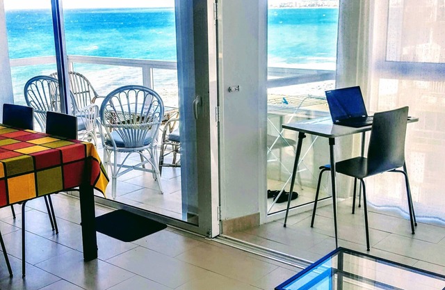 Renovated fantastic beachfront apartment. Sleeps 4, pool and children pool, tenn