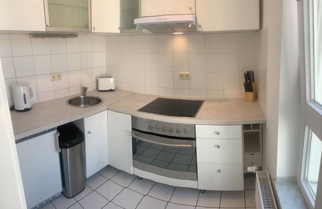 Renovated modern 2-room apartment with balcony and underground parking near the university