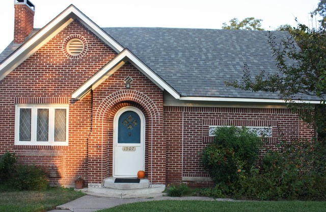 Right in the middle of town, charming 1930's brick home.