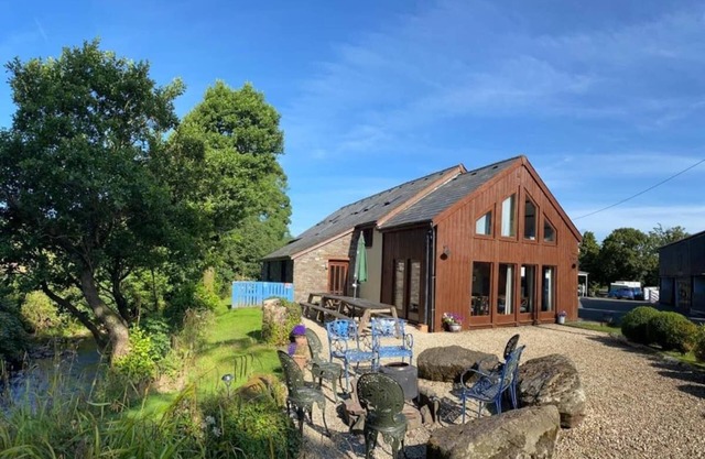 Riverbank Barn Conversion (dated 1770) Offers Luxury Accommodation 15 People