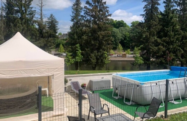 Riverside house with heated outdoor pool, jacuzzi and chateau views
