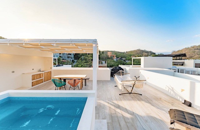 Rooftop Plunge Pool & Surf-Friendly Beachside Comfort