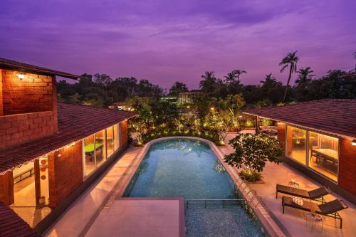 SaffronStays Laterite Grove