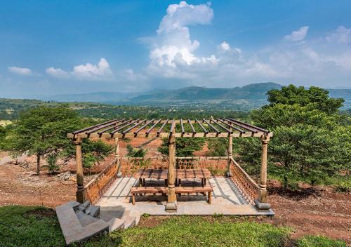 SaffronStays Niramay, Torna-Rajgad - rustic pool villa with a gazebo and great forest views
