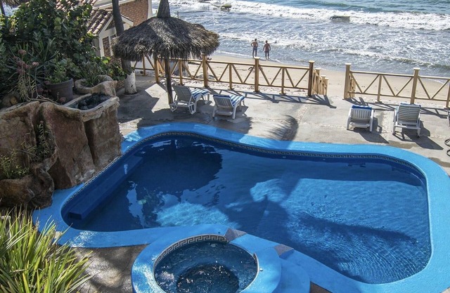 Sandcastle Beachfront Villa with Pool