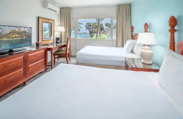 Scenic Afternoon Beach Stroll: Two Ocean View Rooms with Outdoor Pool Access