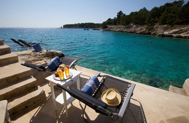 Seafront Villa with Heated Pool & Boat Mooring - Grocery & Chef Service optional