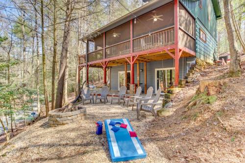 Secluded Cherry Log Cabin with Hot Tub and Swings!