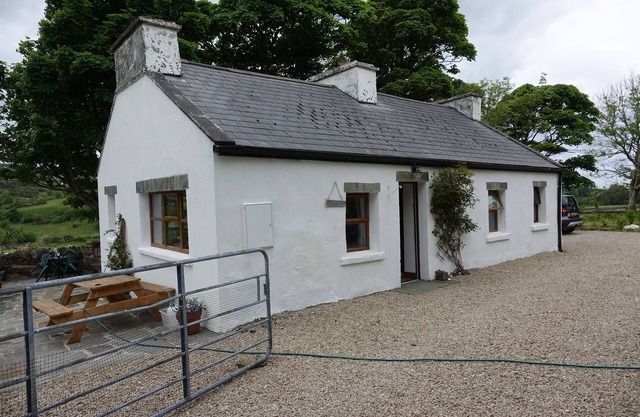 Secluded cottage in stunning mountain scenery near village