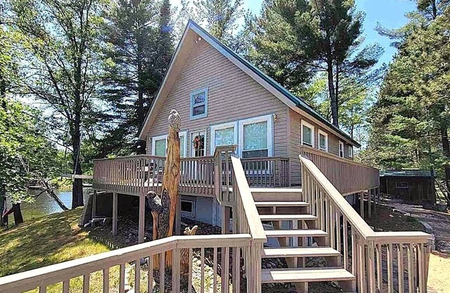 Secluded Peninsula with Panoramic Views on Lake Ogemaw!