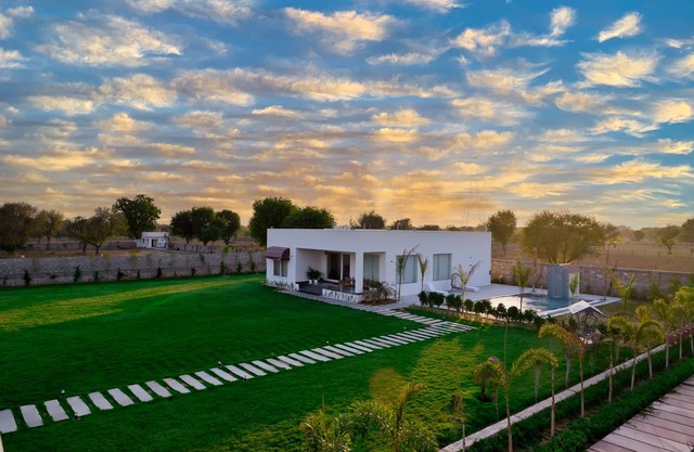 Serene environment with lush green garden. nPollution free environment