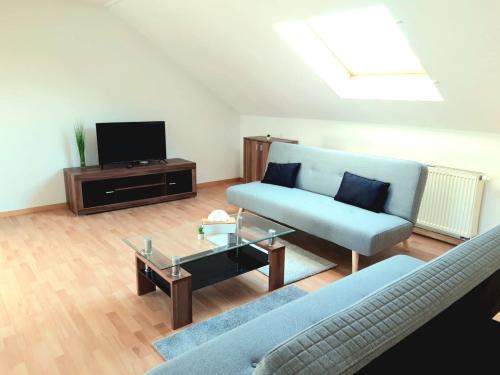 Seyfarthrooms - Großröhrsdorf 2 - zentrale Lage, stilvolle Einrichtung, Blick in den Garten