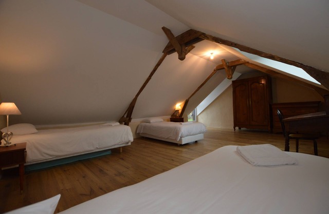 Single room in Gîte, kitchen and living room.