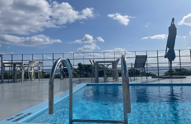 Sky Rooftop Room / Nanjo Okinawa