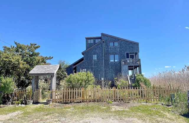 Skynear: Private sweeping panorama of natural salt marsh and sound.