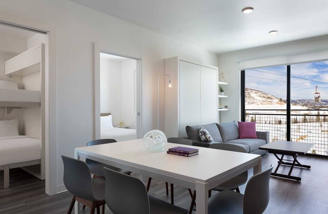 Spacious 2 Bedroom End Unit | Heated Pool | Hot Tub | Balcony | Walk to Lifts